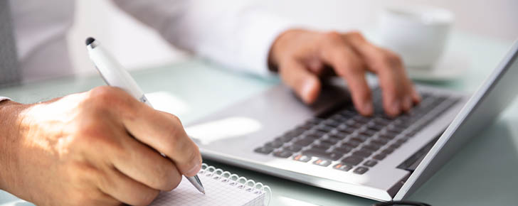 close-up of businessman on laptop