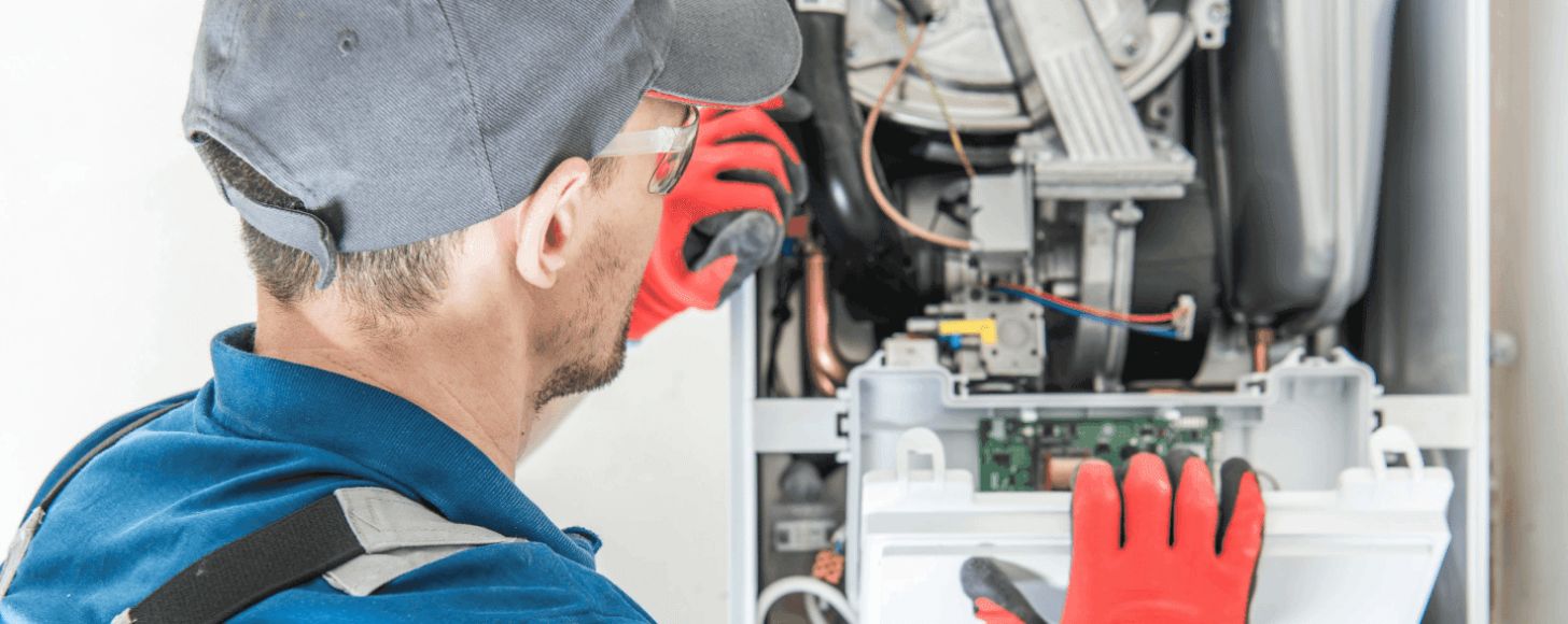 HVAC employee working on home